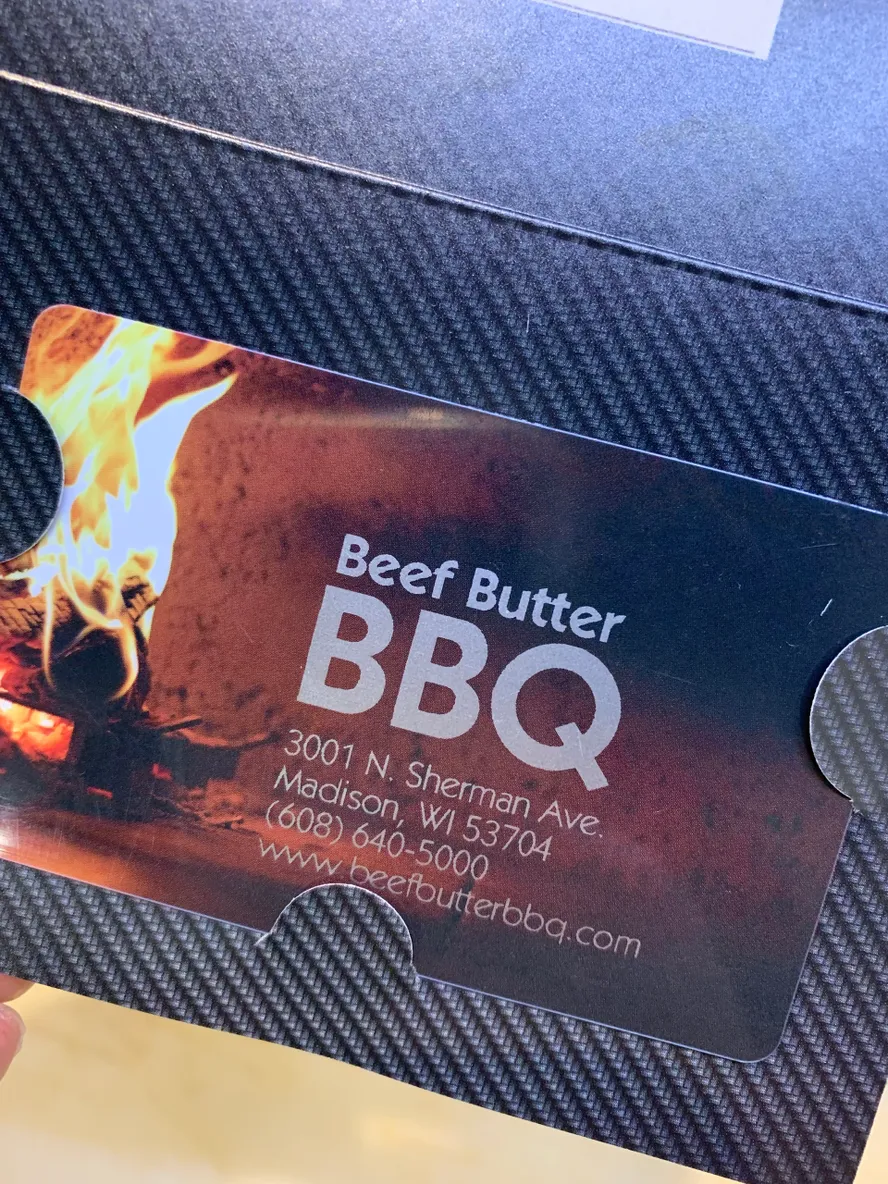 A business card with the words beef butter bbq on it.