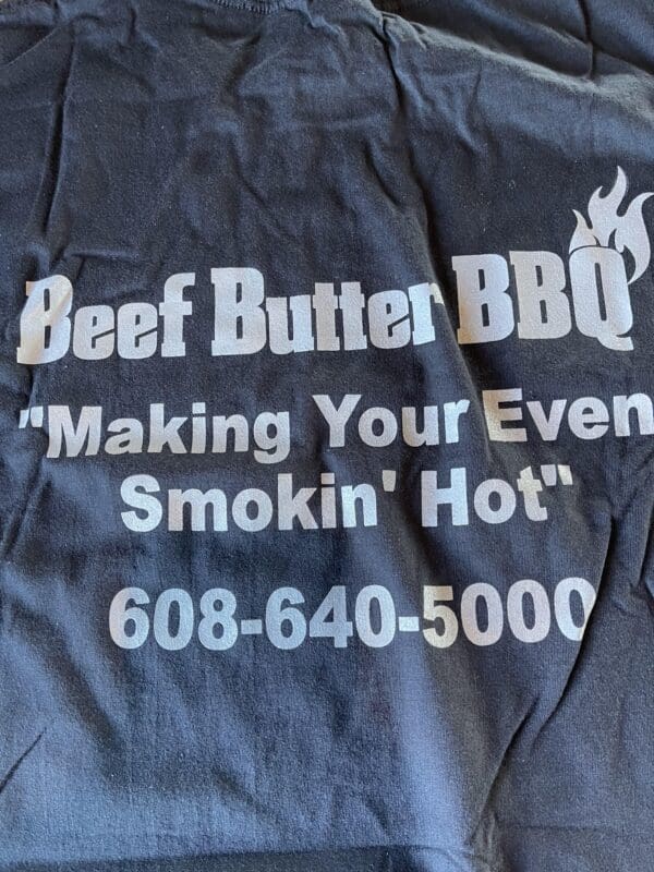 A black t-shirt with the words beef butter bbq on it.