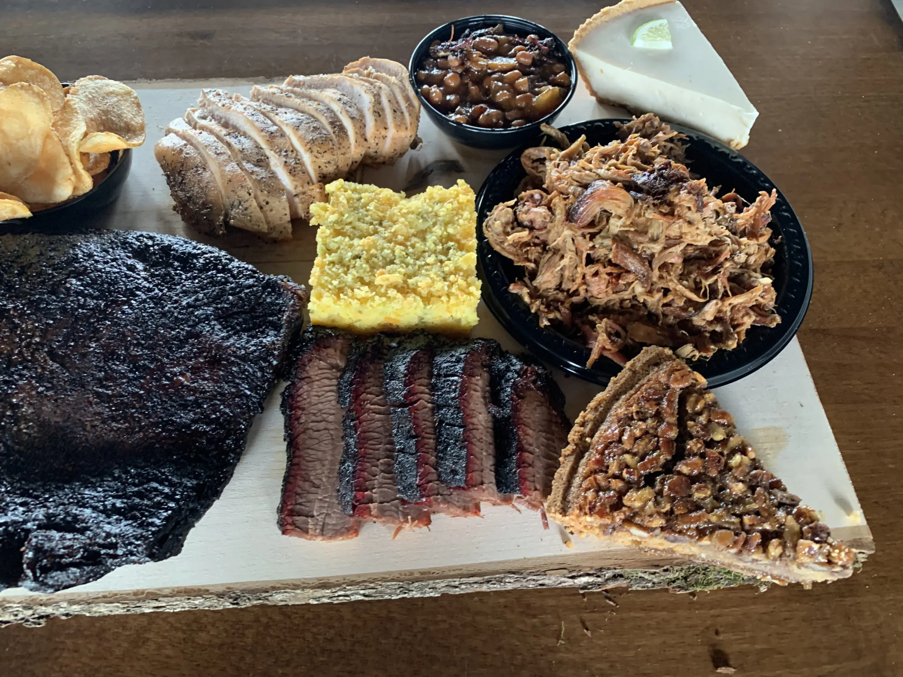 A tray of different types of food on top of a table.